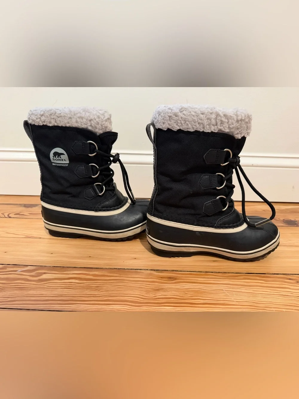 Sorel Black Kids' Snow Boots with Faux Fur